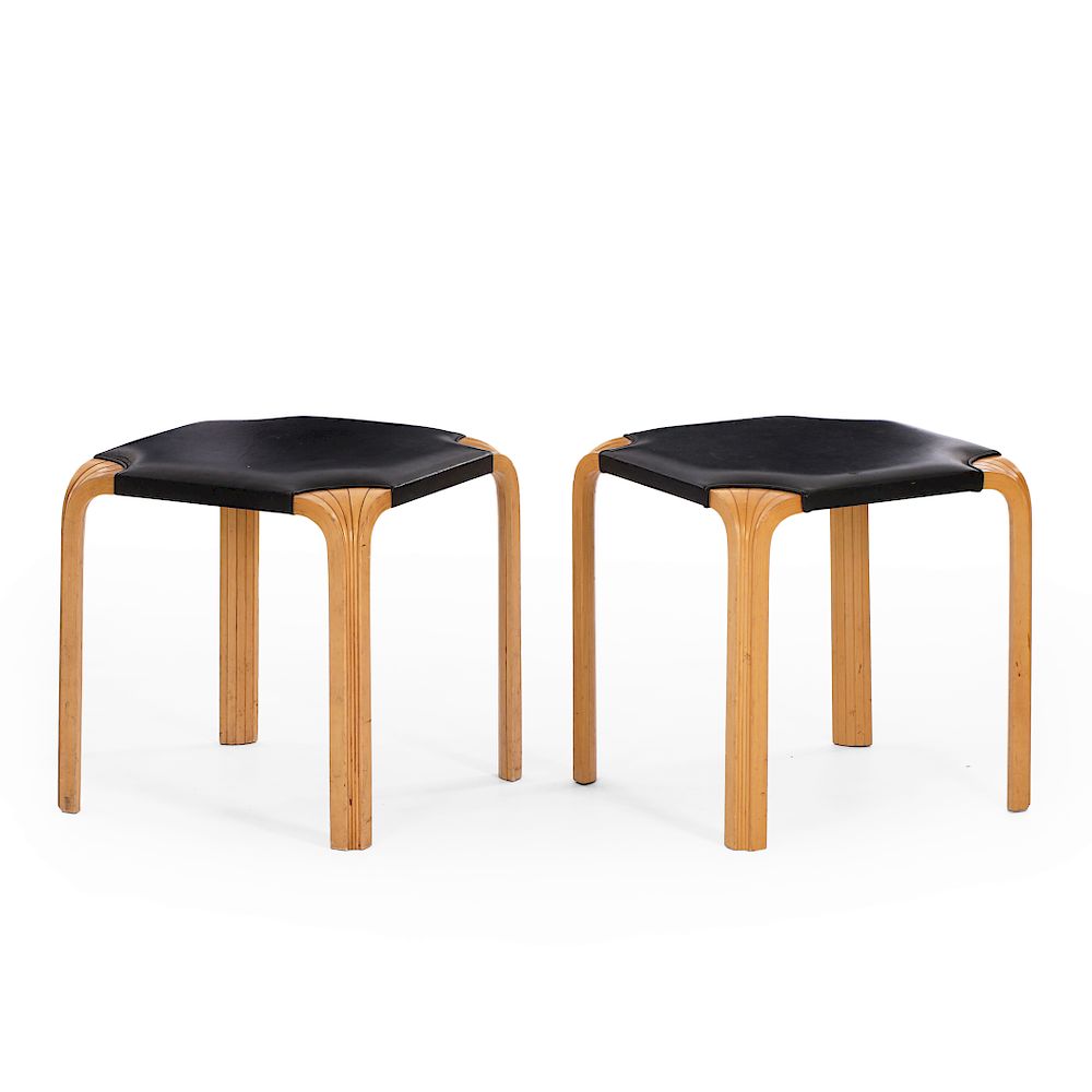 Appraisal: Alvar Aalto A pair of X-leg stools with black leather