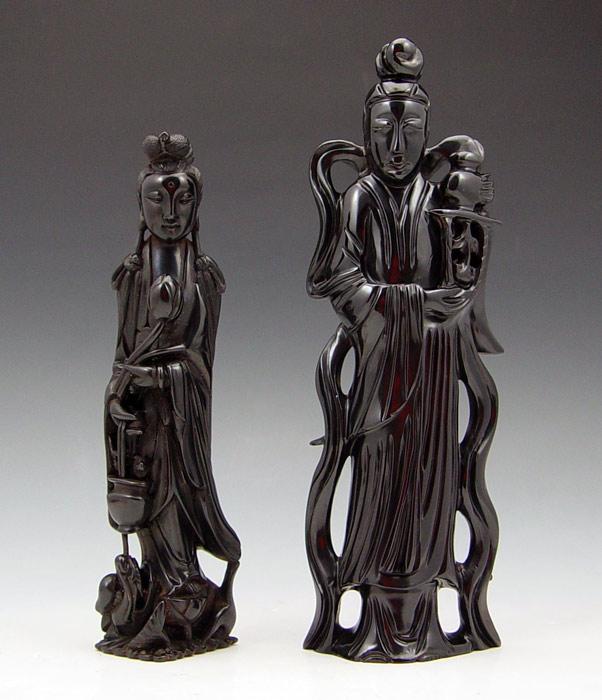 Appraisal: PIECE CHINESE CARVED RED AMBER FIGURES Man and woman ''h