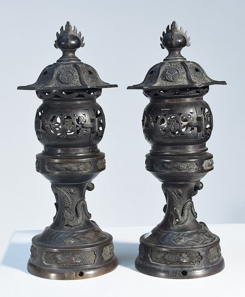 Appraisal: Pair Chinese bronze miniature table lanterns Pair Chinese bronze miniature