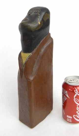 Appraisal: Folk art carving African American man in polychrome paint Has