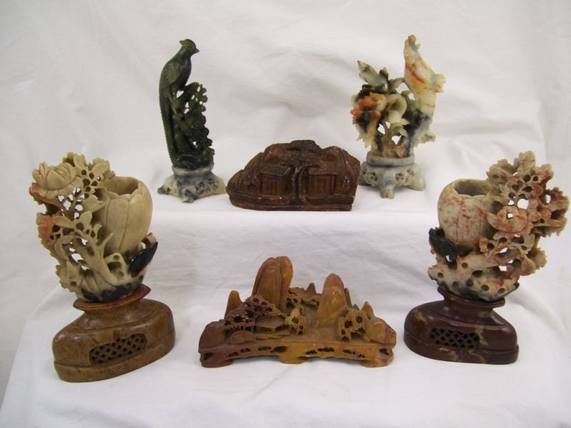 Appraisal: - Carved Soapstone Figures Includes Carved village scene measures high