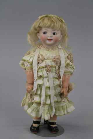 Appraisal: HERTEL SCHWAB GOOGLY TODDLER DOLL Pale bisque socket head incised