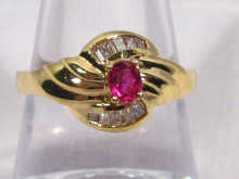 Appraisal: A hallmarked carat gold ruby and diamond cluster ring