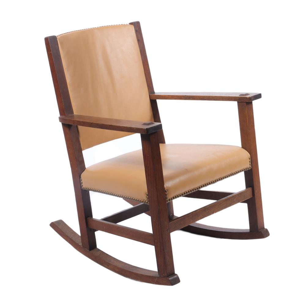 Appraisal: LIMBERT ARTS CRAFTS OAK ROCKING CHAIR WITH CARAMEL LEATHER SEAT