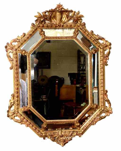 Appraisal: A TH CENTURY FLEMISH STYLE CRAVED GILTWOOD HANGING WALL MIRROR