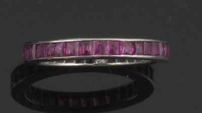 Appraisal: A ruby full circle eternity ring Set with calibre cut