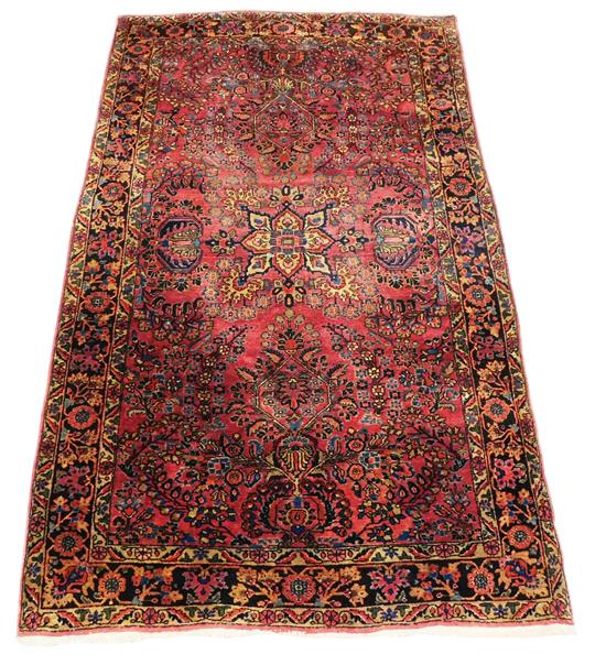 Appraisal: Antique Persian Sarouk scatter rug dark red field unraveled ends