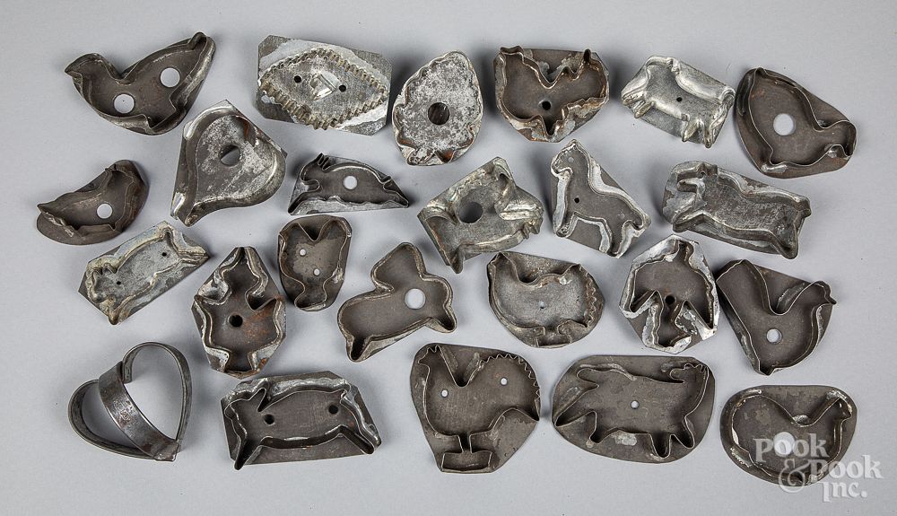 Appraisal: Collection of twenty-four tin cookie cutters Collection of twenty-four tin