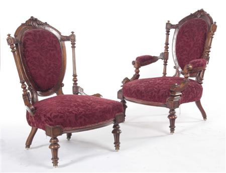 Appraisal: A pair of Victorian walnut lady's and gentleman's chairs each