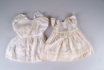 Appraisal: PIECES OF BABY DOLL CLOTHING CONDITION Overall good to very