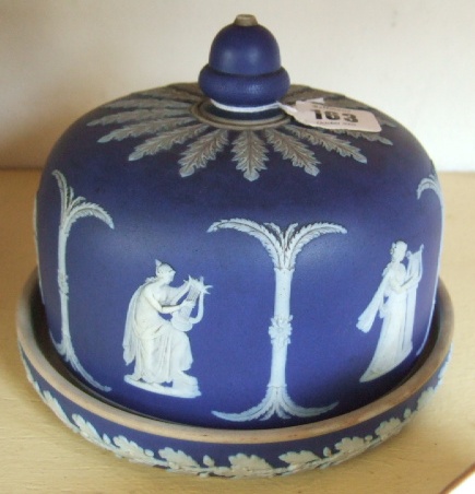 Appraisal: A Wedgwood jasperware cheese dome with acorn finial and applied