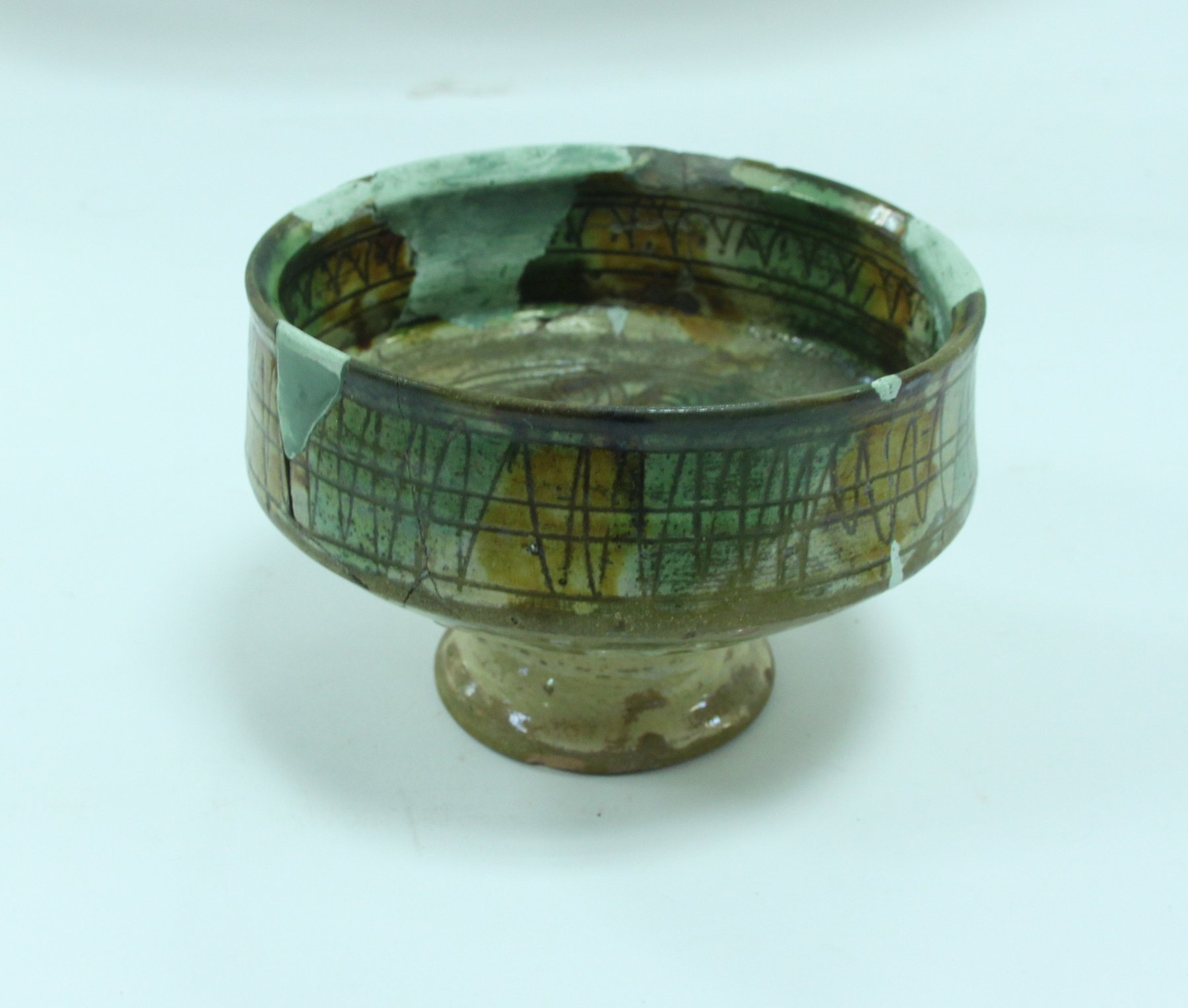 Appraisal: A Byzantine glazed pottery footed bowl th - th Century