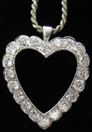 Appraisal: karat white gold and diamond heart pendantW in dwt