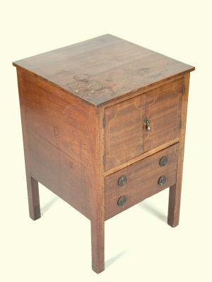 Appraisal: A mahogany pot cupboard early th century with two string