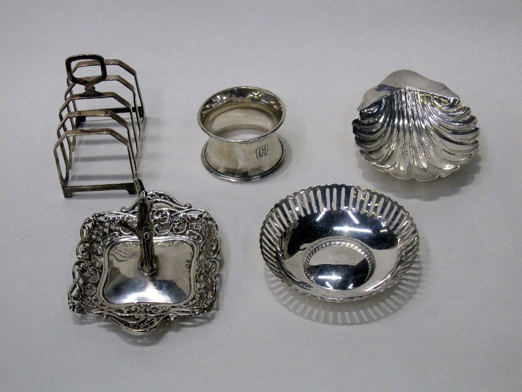 Appraisal: Lot comprising silver ring tree toastrack two dishes and a