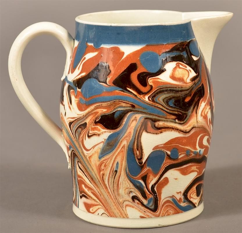 Appraisal: Marbleized Mocha Decorated Bulbous Pitcher Marbleized Mocha Decorated China Milk