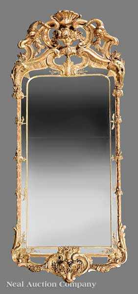 Appraisal: A Swedish Rococo Carved Giltwood Mirror th c C and