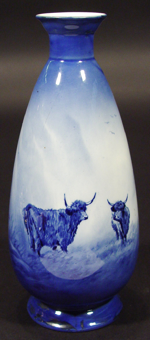 Appraisal: Fieldings Devonware flow blue vase decorated with Highland cattle printed