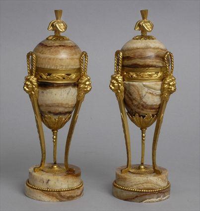 Appraisal: PAIR OF LOUIS XVI-STYLE GILT-BRONZE MOUNTED ONYX BRULES PARFUMS AND