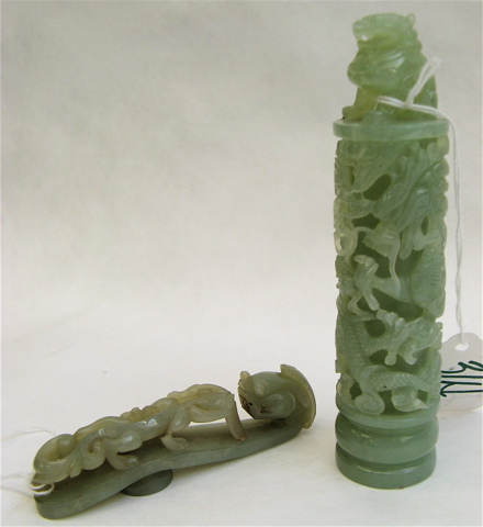 Appraisal: TWO CHINESE CARVED JADE ITEMS Nephrite clothes pin L together