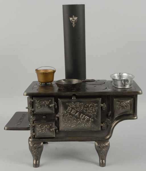 Appraisal: Cast Iron Kenton Beauty Children's Stove Description Includes stovepipe and