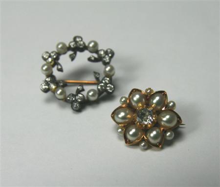 Appraisal: Two pearl and diamond set brooches to include a floral