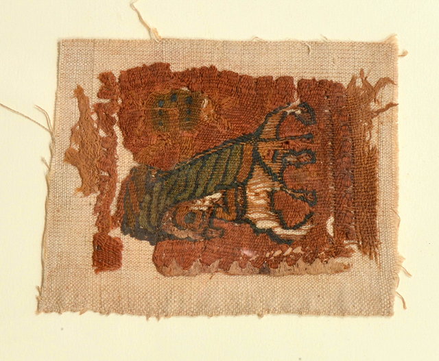 Appraisal: A FRAGMENTAL RECTANGULAR PANEL depicting a scorpion on a red