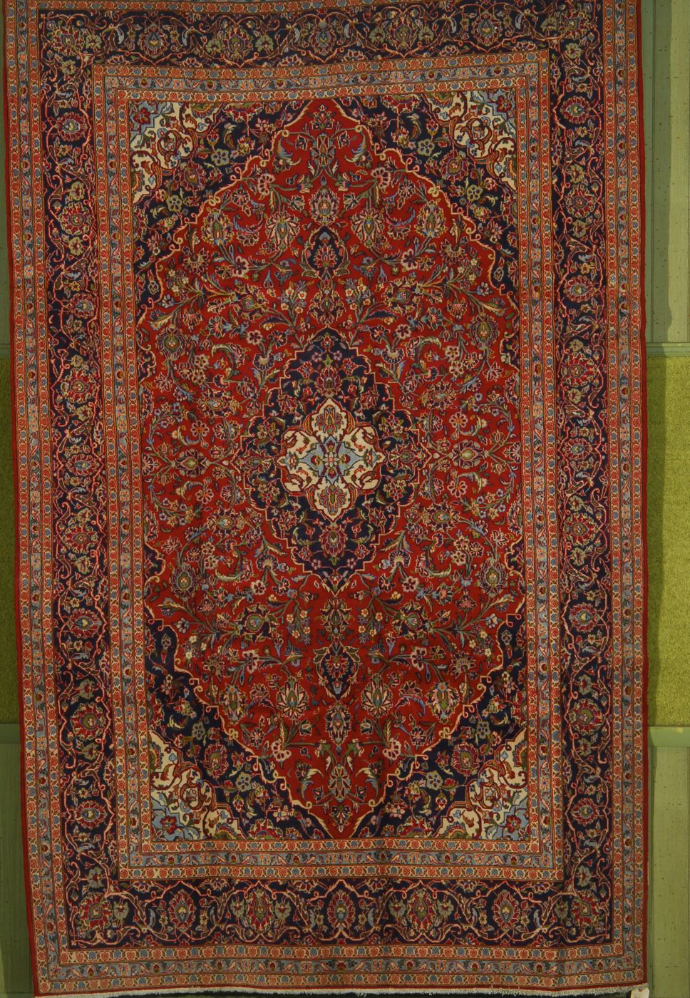 Appraisal: ORIENTAL RUG KESHAN ' x ' With a central lozenge-form