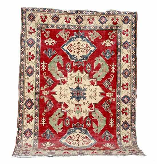 Appraisal: Afghan Kazak carpet ' '' x ' '' Provenance New