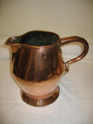 Appraisal: A GEORGIAN COPPER HARVEST JUG of baluster form the body