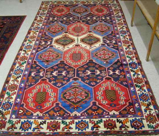 Appraisal: PERSIAN TRIBAL PANEL CARPET hand knotted ' x '