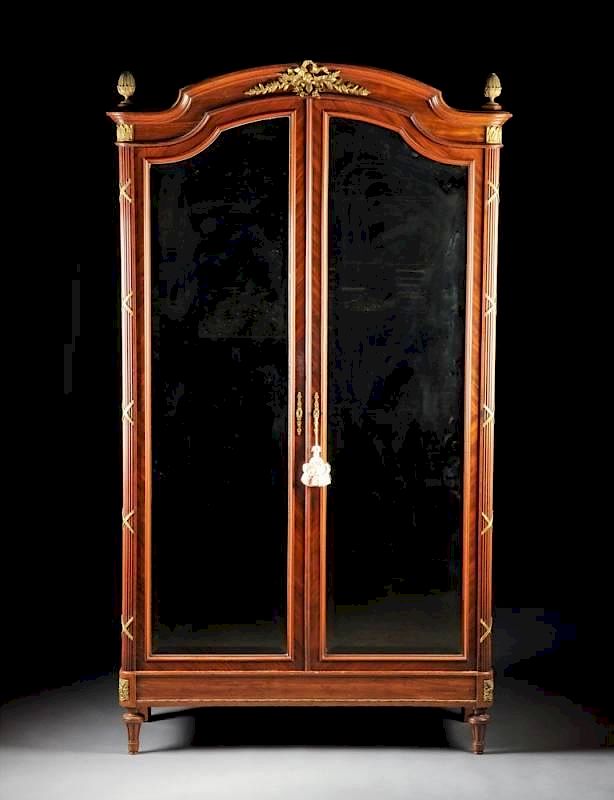 Appraisal: A LOUIS XVI STYLE GILT BRONZE MOUNTED MAHOGANY ARMOIRE WITH