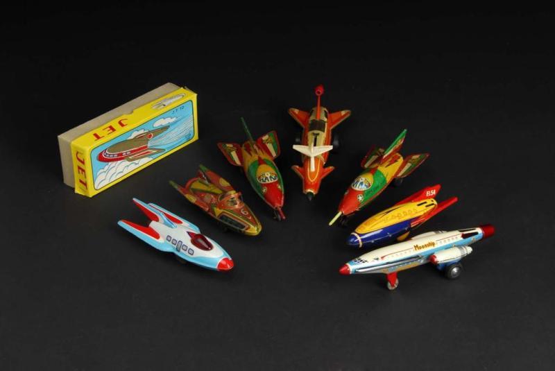 Appraisal: Lot of Tin Rocket Ship Friction Toys Description All are