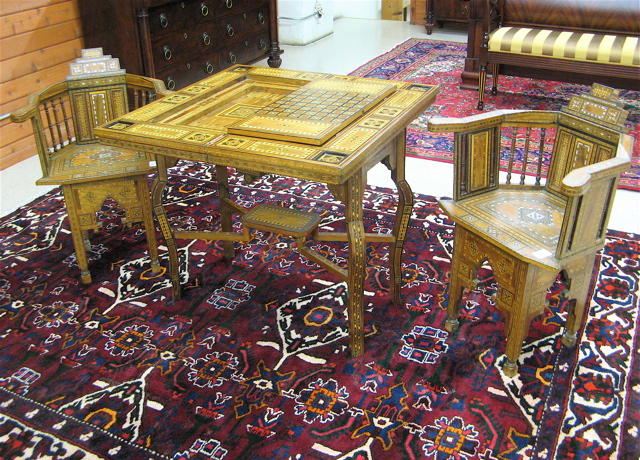 Appraisal: THREE-PIECE INLAID GAME TABLE AND CHAIR SET Syrian c the