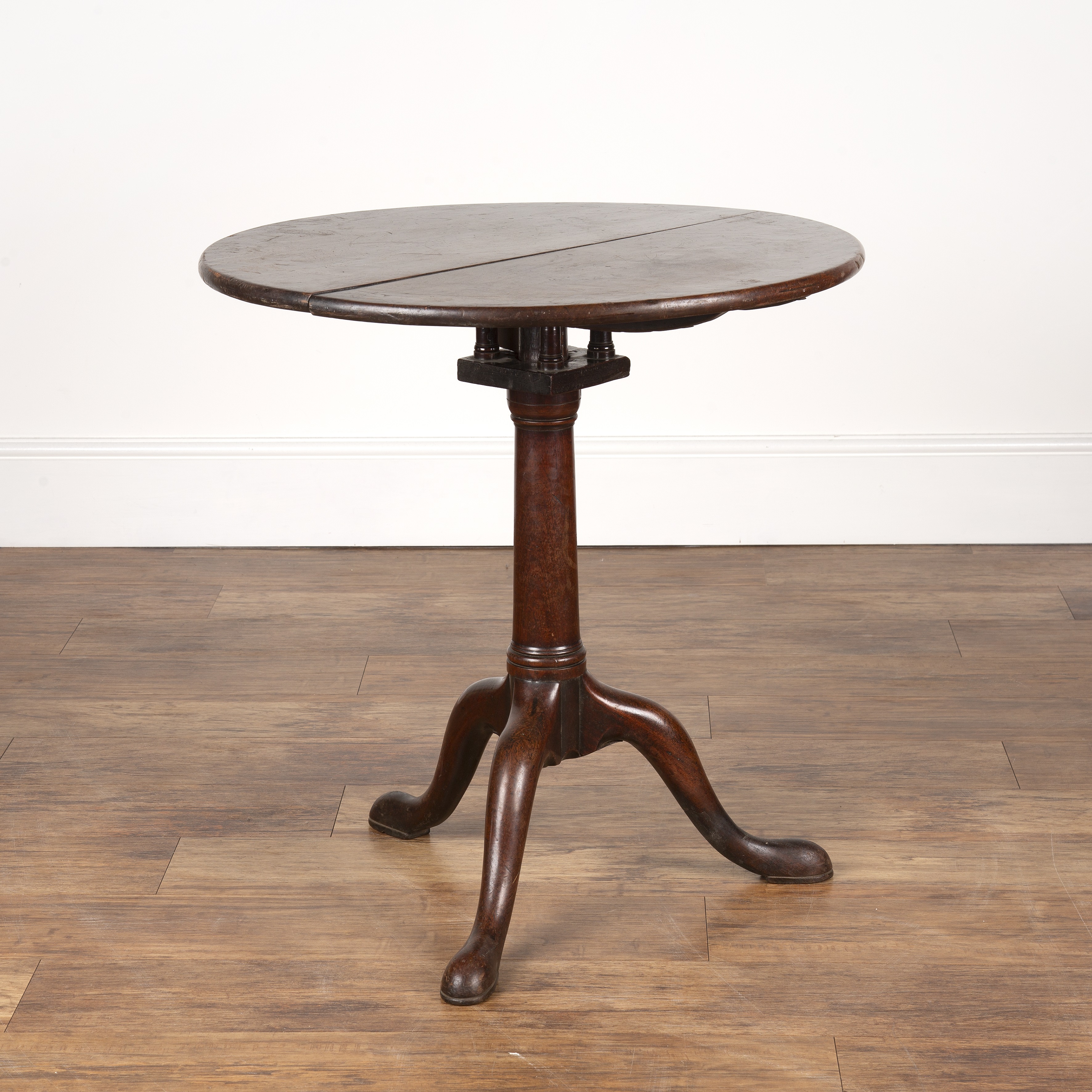 Appraisal: Mahogany tip-up tripod tableearly th Century with birdcage column and