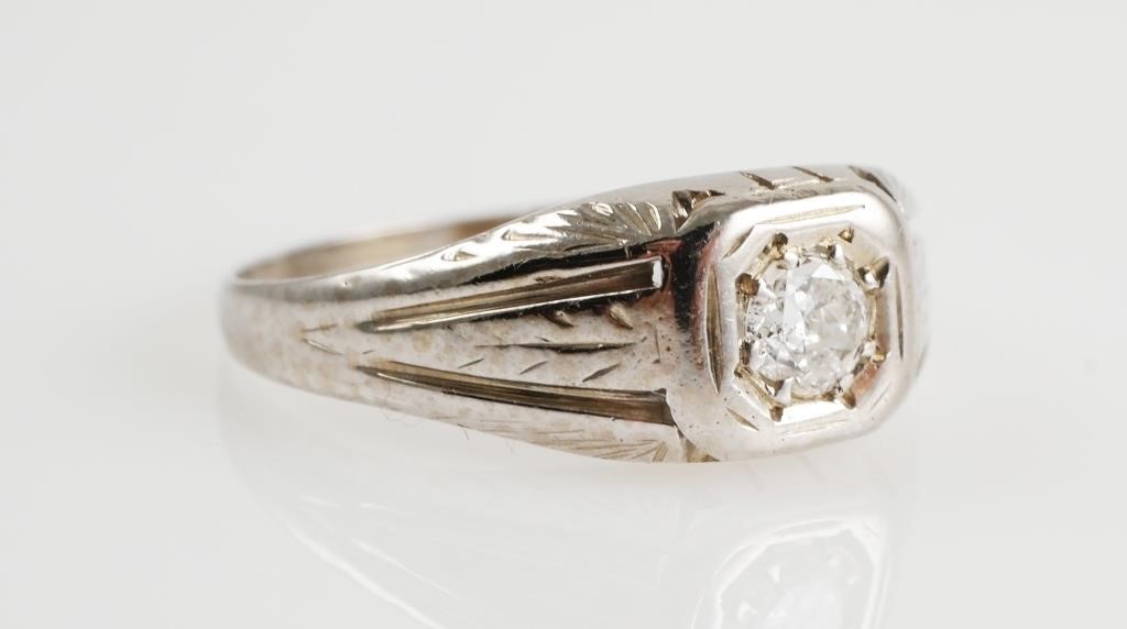 Appraisal: ct single stone diamond set in K hand engraved white