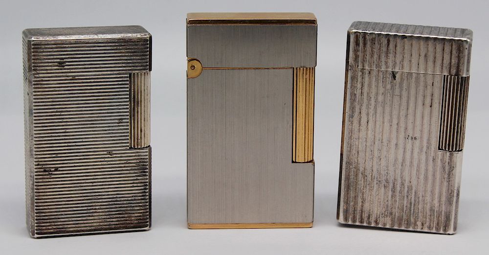 Appraisal: Grouping of St Dupont Lighters Includes a St Dupont lighter