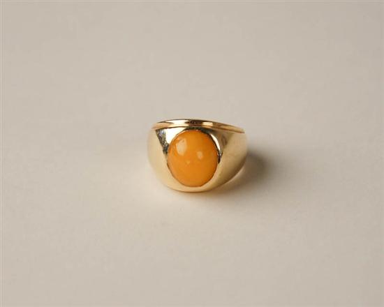 Appraisal: A Gold and Amber Ring K tested yellow gold set