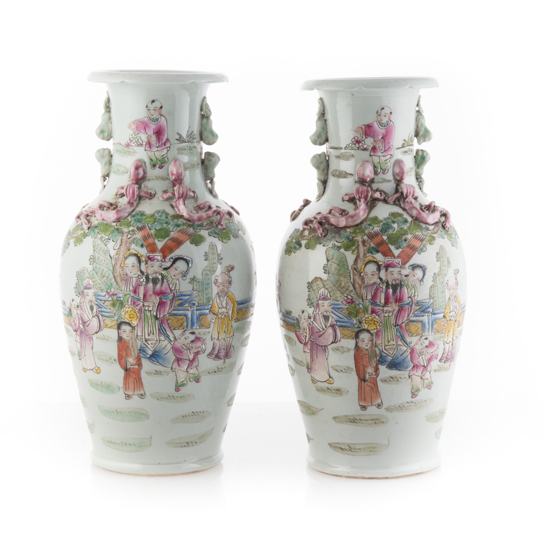 Appraisal: Pair Chinese Export Famille Rose vases decorated figures in exotic