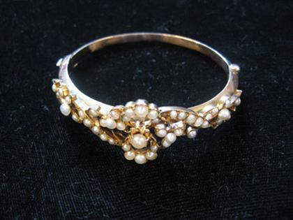 Appraisal: karat yellow gold pearl and diamond bangle bracelet Accented by