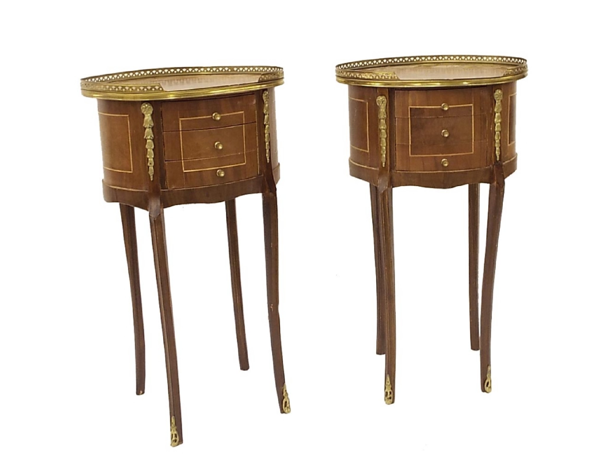 Appraisal: Pair of French oval cylindrical bedside chests with raised gallery