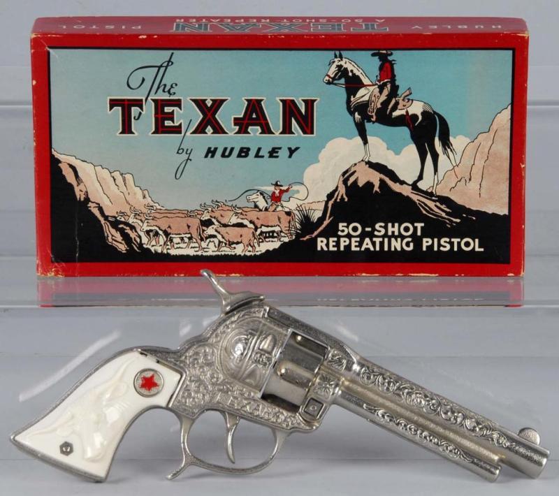 Appraisal: Cast Iron Hubley Texan Cap Gun Description Includes box Toy