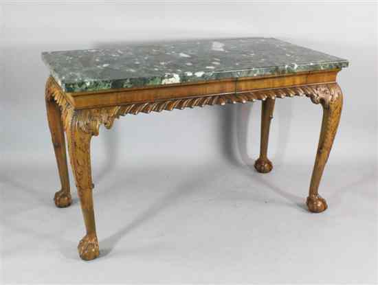 Appraisal: A George I design carved walnut side table with veined