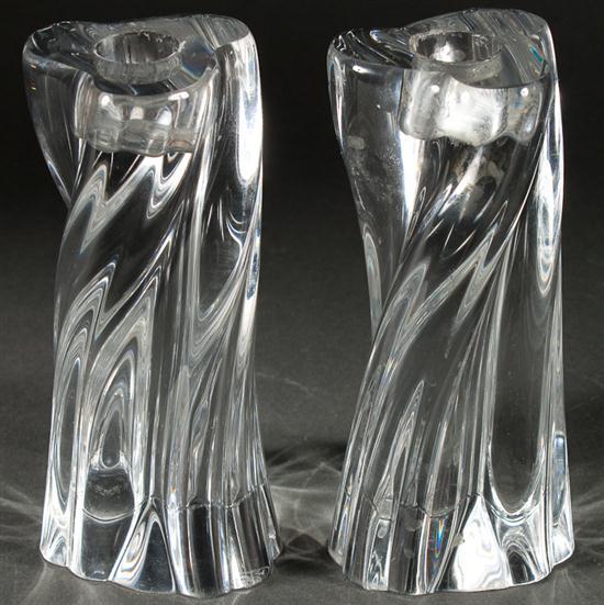 Appraisal: Pair of Baccarat molded crystal swirl-form candle holders in H