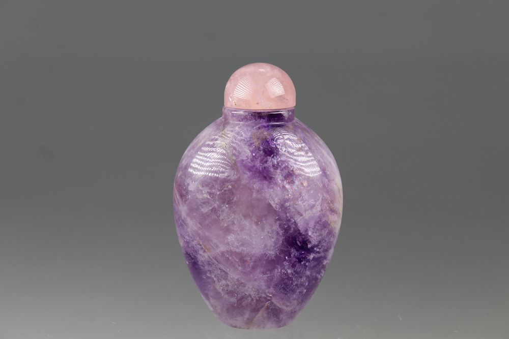 Appraisal: Chinese Carved Amethyst Snuff Bottle Chinese Carved Amethyst Snuff Bottle