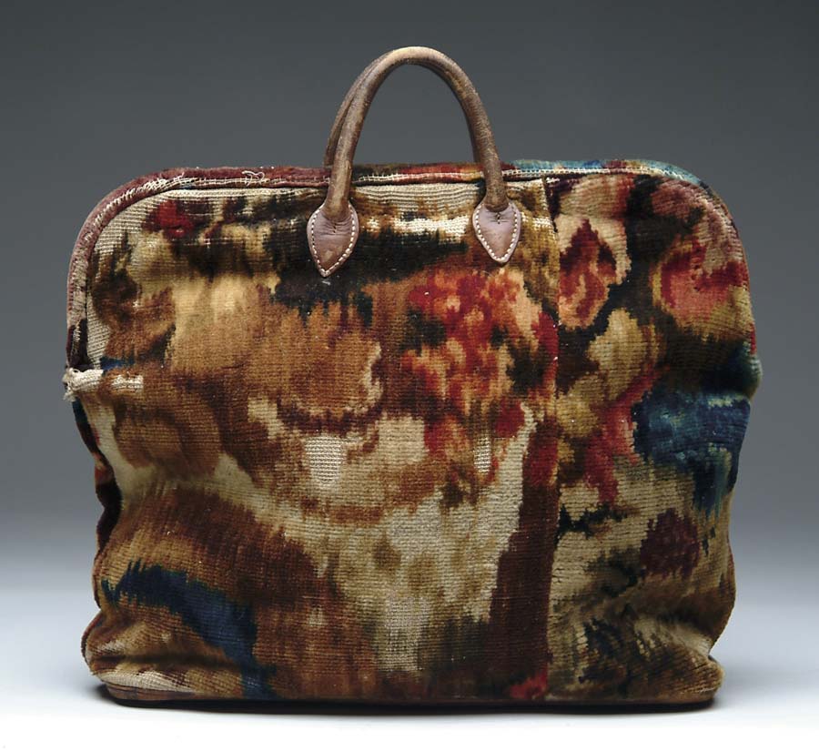 Appraisal: CIVIL WAR ERA CARPET BAG About x two sewn leather