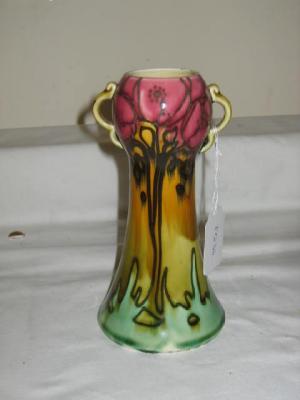 Appraisal: A MINTONS SECESSIONIST VASE with garlic neck two loop handles