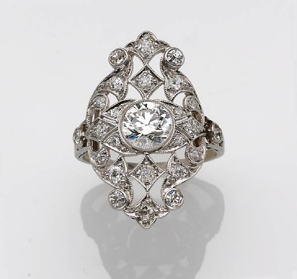 Appraisal: A diamond ring centering a European-cut diamond estimated total diamond