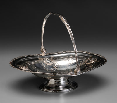 Appraisal: Medallion Silver-Plated Basket American late th century oval with four