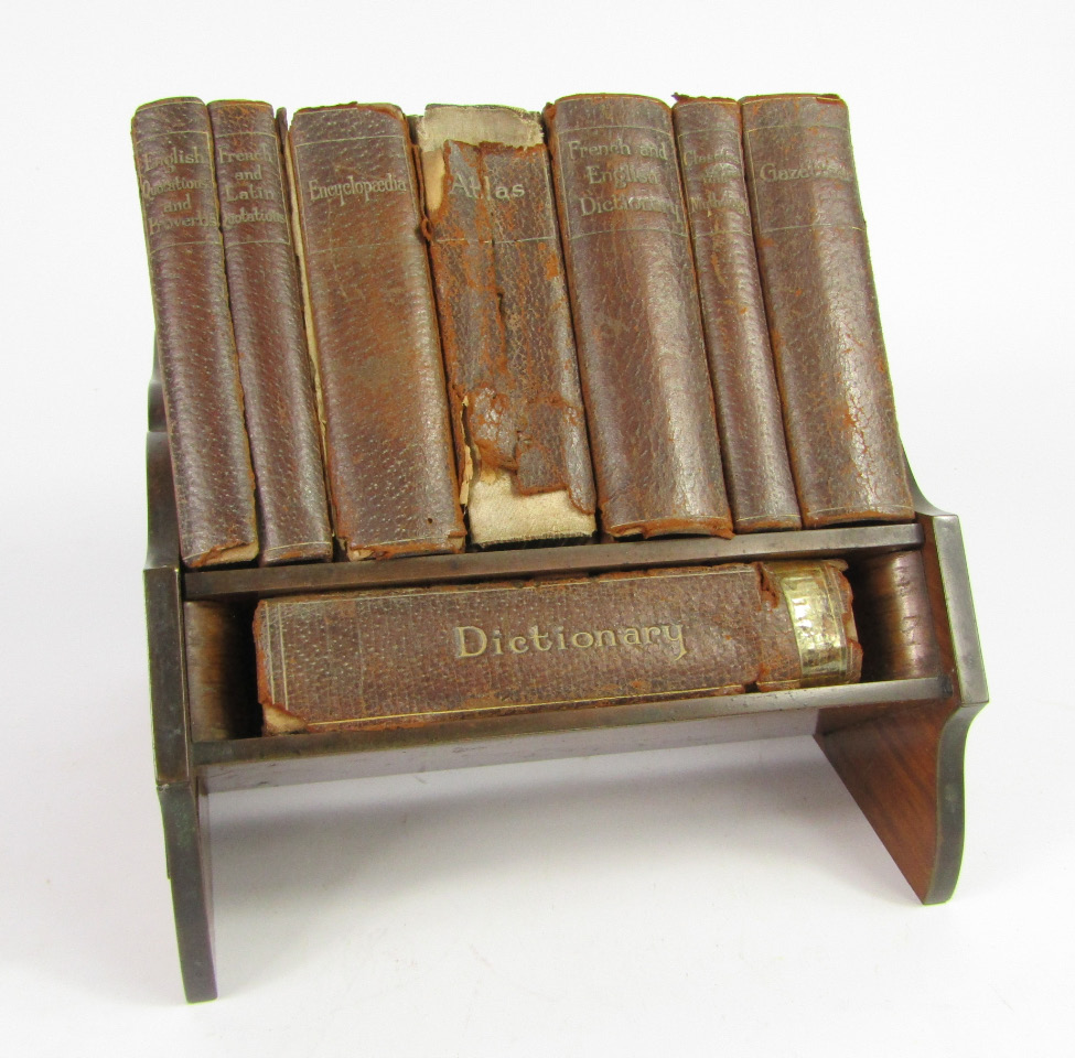 Appraisal: An early thC Asprey's leather bound reference library comprising dictionary